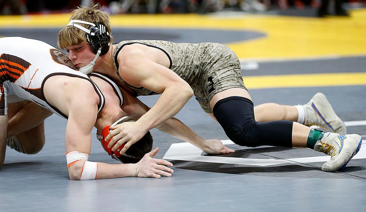 Clear Fork's Luke Schlosser wrestles Padua's Devin Shaw-Mason during their 165 lbs. match at the OHSAA State Wrestling Championships Sunday, March 12, 2023 at the Jerome Schottenstein Center. . TOM E. PUSKAR/ASHLAND TIMES-GAZETTE