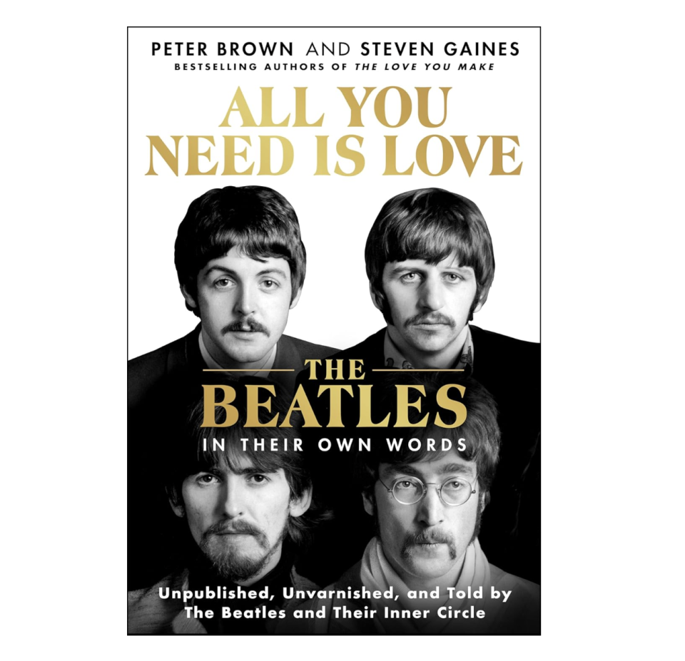 black and white book cover with photo of the beatles