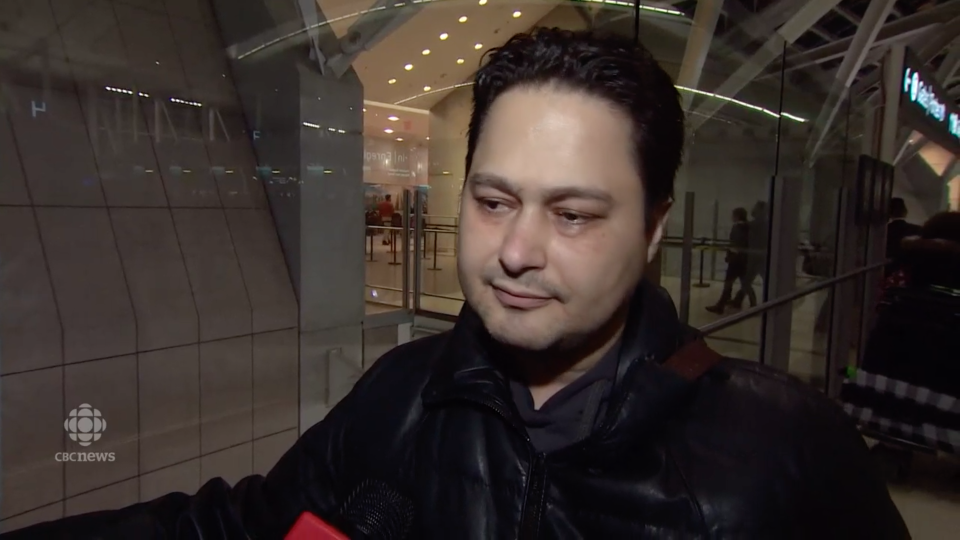 Picture of  Hassan Shadkoo speaking to CBC News following the death of his wife