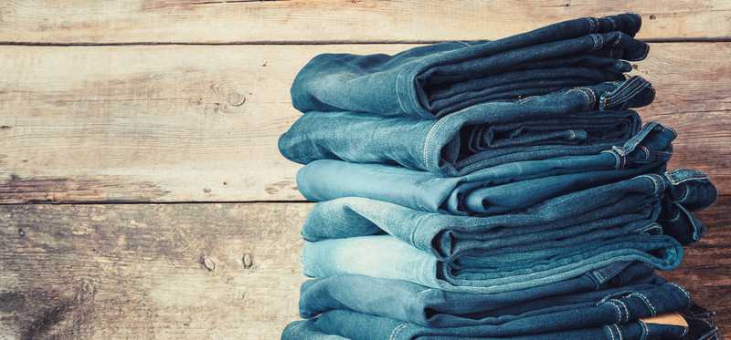 A stack of denim jeans.