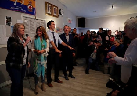 Liberal leader and Canadian Prime Minister Justin Trudeau and his wife Sophie Gregoire Trudeau visit a Royal Canadian Legion as he campaigns for the upcoming election, in Greenfield Park