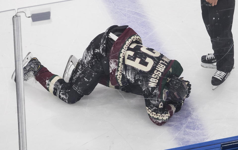 Arizona Coyotes' Oliver Ekman-Larsson (23) is hurt against the Nashville Predators during second period NHL qualifying round game action in Edmonton, on Wednesday, Aug. 5, 2020. (Jason Franson/The Canadian Press via AP)