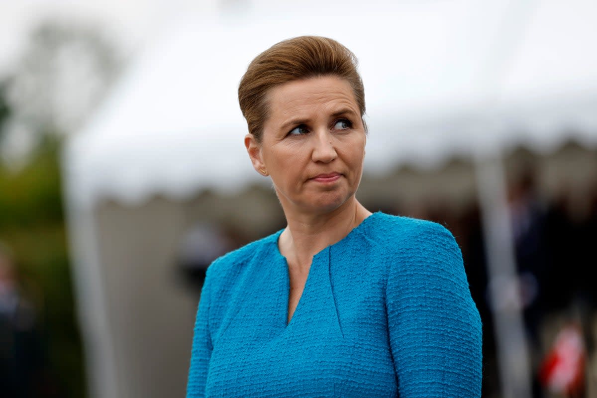 Denmark's Prime Minister Mette Frederiksen attends a ceremony at the Danish monument (AP)