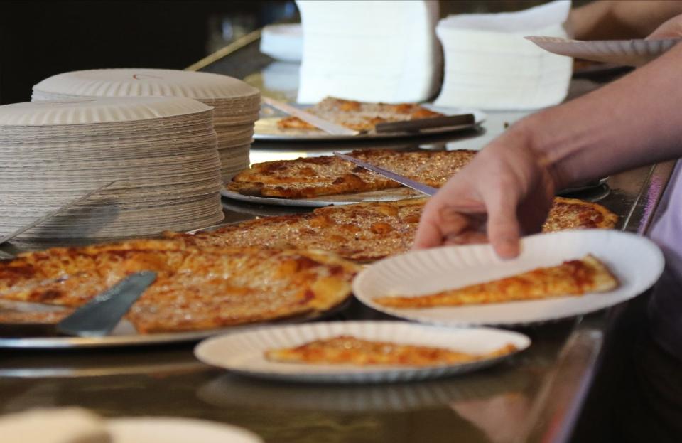 Pizza's line the bar as they are about to be delivered to judges that are part of the Facebook group Jersey Pizza Joints who held a best pizza cook off at Redd's  in New Brunswick, NJ on February 6, 2021.