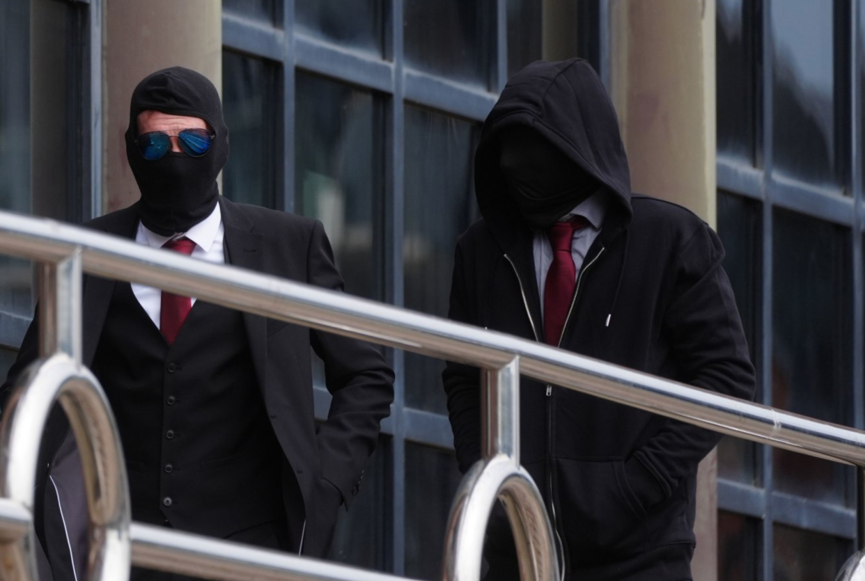 Daniel Graham (left) and Adam Carruthers arrive at Newcastle Upon Tyne Magistrates' Court in connection with the felling of the Sycamore Gap tree. (PA)