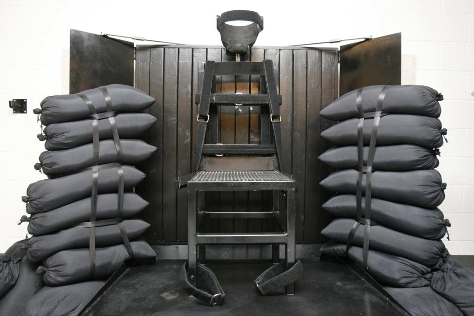 FILE - In this June 18, 2010, file photo, the firing squad execution chamber at the Utah State Prison in Draper, Utah, is shown. With lethal-injection drugs in short supply and new questions looming about their effectiveness, lawmakers in some death penalty states are considering bringing back relics of a more gruesome past, including firing squads. (AP Photo/Trent Nelson, Pool, File)