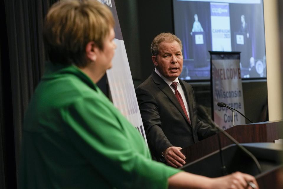 Wisconsin Supreme Court candidates Republican-backed Dan Kelly and Democratic-supported Janet Protasiewicz participate in a debate Tuesday, March 21, 2023, in Madison, Wis. (AP Photo/Morry Gash)