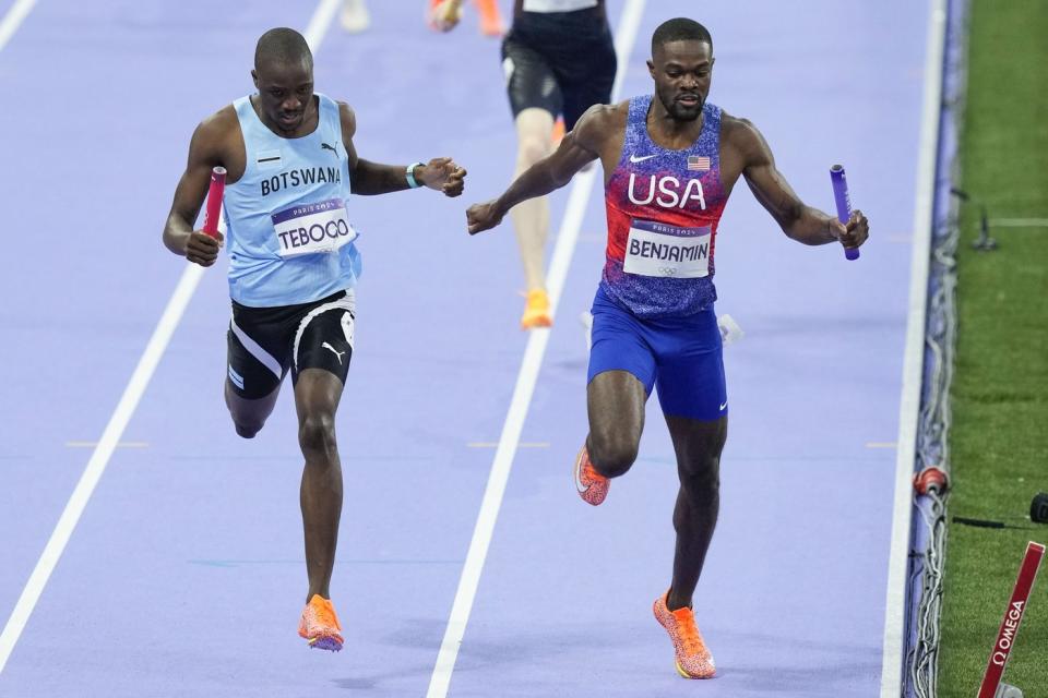 Benjamin of US holds off Tebogo of Botswana to win men's 4x400 relay at