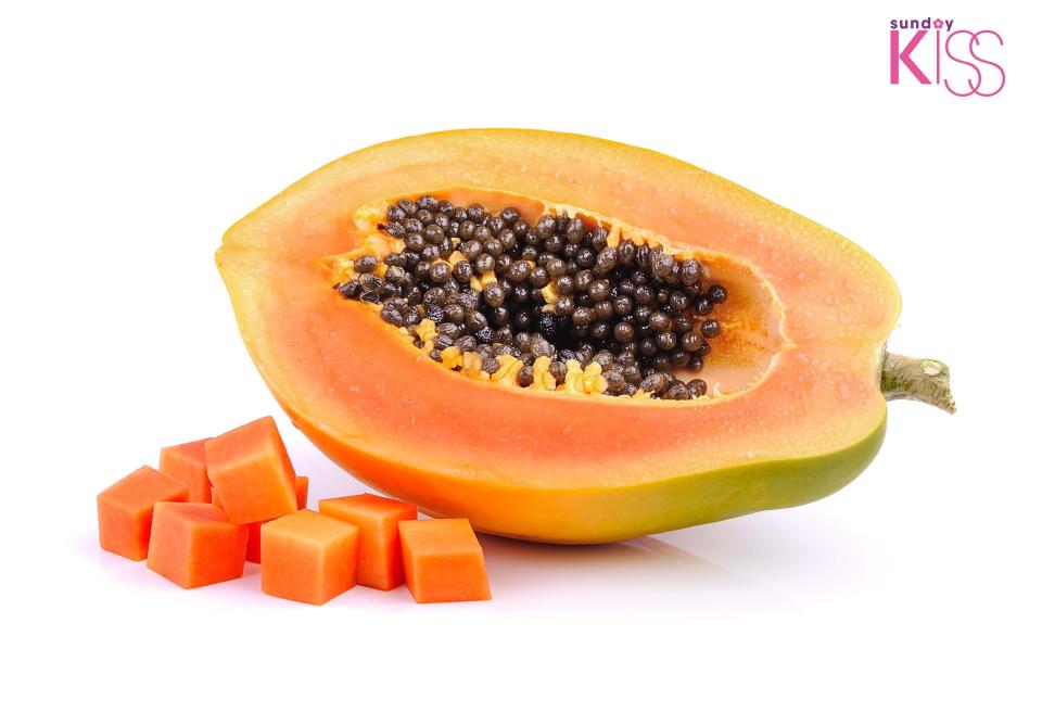 ripe papaya isolated on a white background