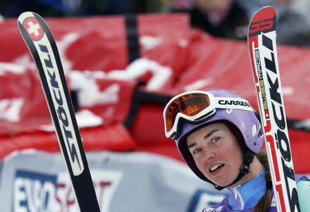 Tina Maze of Slovenia reacts in the finish area after her fisrt run of the women's giant slalom race at the Alpine Skiing World Cup Finals in Meribel, in the French Alps, March 22, 2015. REUTERS/Robert Pratta