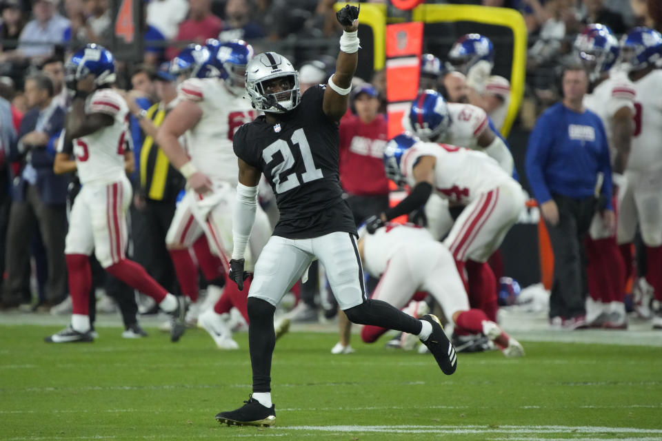 Las Vegas Raiders cornerback Amik Robertson (21) celebrates a defensive stop against the New York Giants during the second half of an NFL football game, Sunday, Nov. 5, 2023, in Las Vegas. (AP Photo/Rick Scuteri)