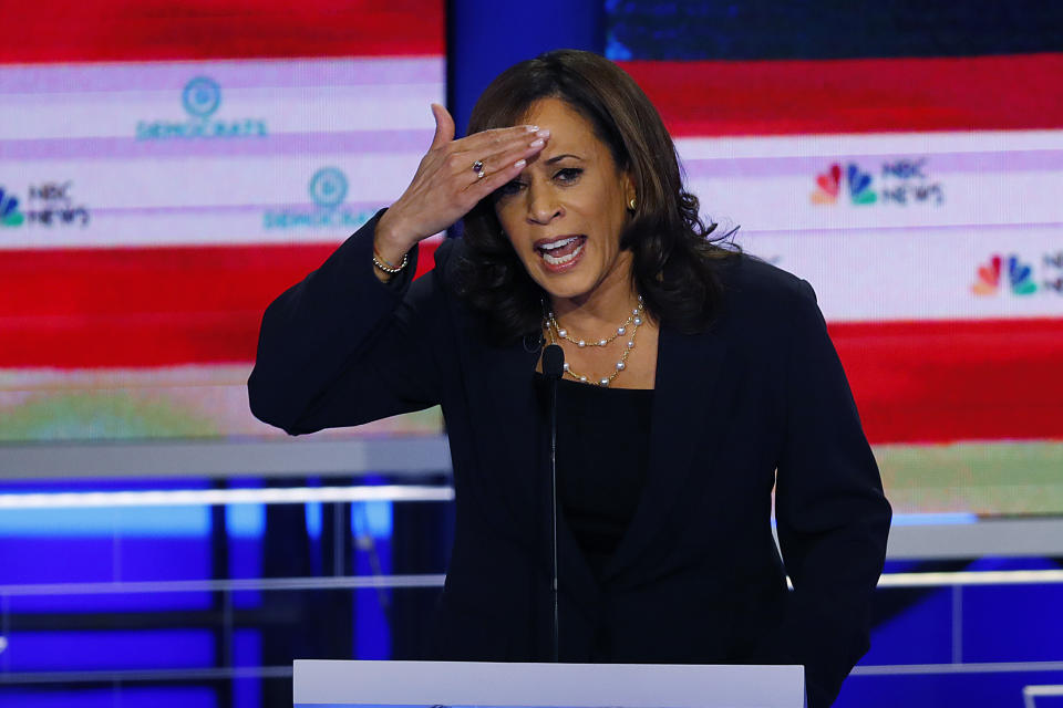 In this June 27, 2019, photo, Democratic presidential candidate Sen. Kamala Harris, D-Calif., gestures during the Democratic primary debate hosted by NBC News at the Adrienne Arsht Center for the Performing Arts in Miami. (AP Photo/Wilfredo Lee)