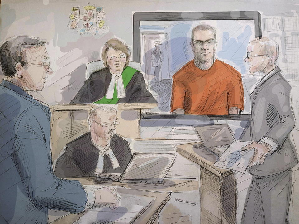 File-This photo taken May 10, 2018, shows defense lawyer Boris Bytensky, left to right, Justice Ruby Wong, Alek Minassian and Crown prosecutor Joe Callaghan in court as Minassian appears by video in Toronto. A newly released video shows Minassian, accused of driving a van into pedestrians in Toronto and killing 10 people, telling police he accomplished his mission and that he’s part of an online group of sexually frustrated men who plot attacks against people who have sex. (Alexandra Newbould/The Canadian Press via AP, File)