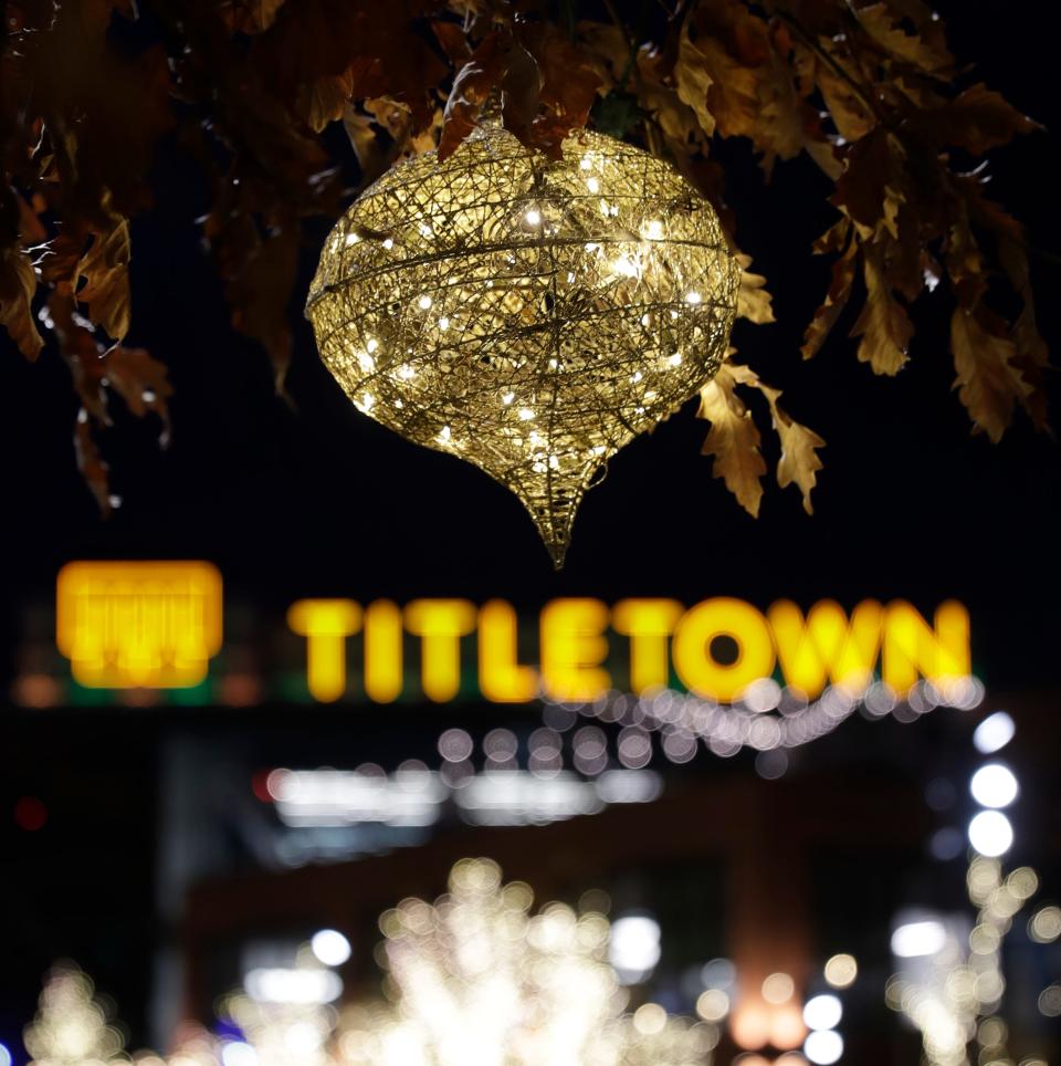 Festive lights illuminate the Green Bay Packers' Titletown District on Dec. 2, 2022, in Ashwaubenon, Wis.