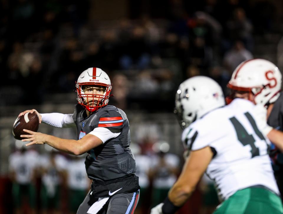 South Salem's Athan Palmateer (9) prepares to throw a pass during the game against West Salem on Friday, Sept. 29, 2023 in Salem, Ore.