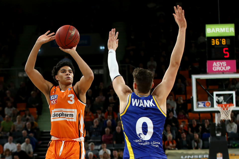 Killian Hayes of Ulm and Lukas Wank of Braunschweig battle for the ball during the EasyCredit Basketball Bundesliga (BBL) match between Ratiopharm Ulm and Basketball Loewen Braunschweig at ratiopharm Arena on February 14, 2020 in Ulm, Germany.