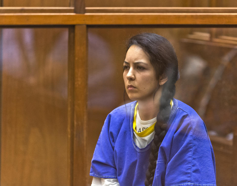 FILE - Alondra Ocampo appears in Los Angeles County Superior Court behind a glass window, on Friday, June 21, 2019. California prosecutors say the leader of the Mexican megachurch La Luz del Mundo, Naasón Joaquín García, pleaded guilty, Friday, June 3, 2022, in Los Angeles Superior Court, to sexual acts with three of his followers who were minors at the time. Two female co-defendants, Susana Medina Oaxaca and Ocampo, admitted facilitating the abuse and have also pleaded guilty. (AP Photo/Damian Dovarganes)