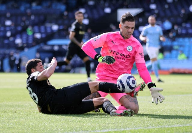 Ederson, right, denies West Ham's Pablo Fornals