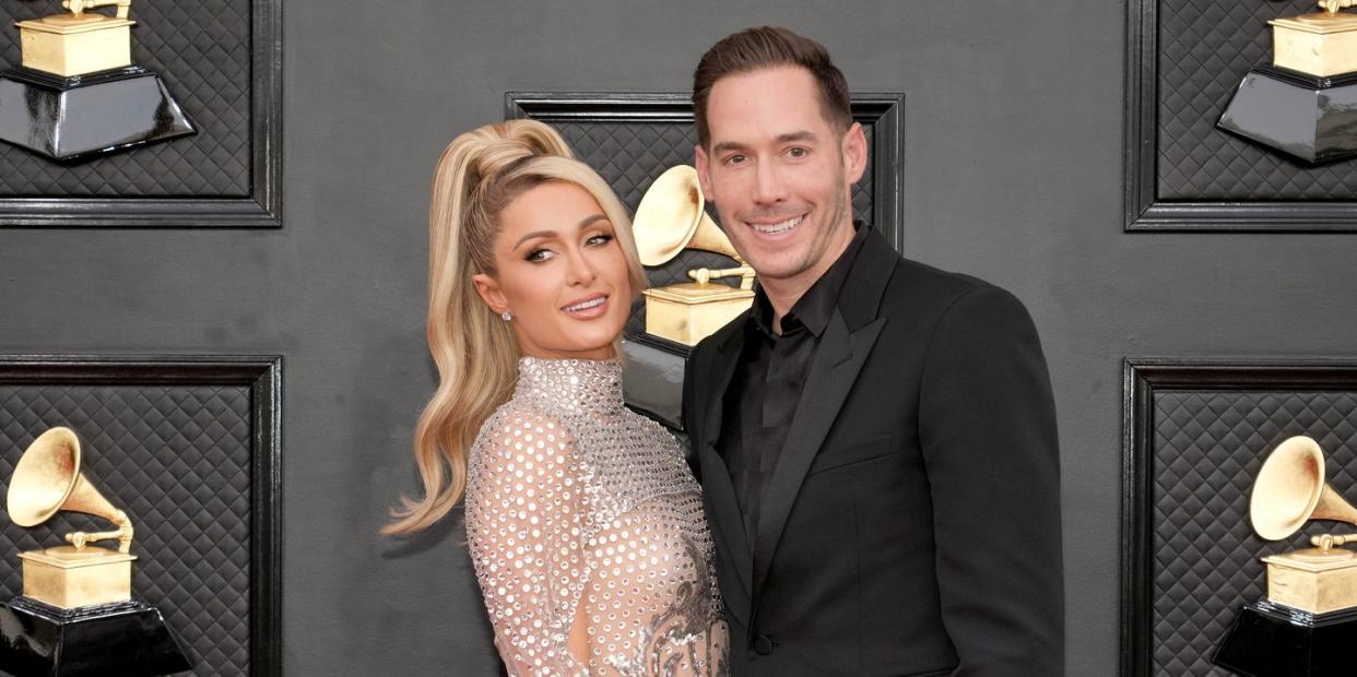 paris hilton and carter reum at the 64th annual grammy awards