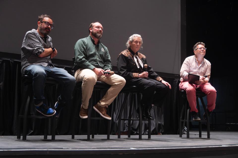 From left, John Barnhardt, John Festervand and Temple Grandin speak with Chip Chandler at the screening of their film, “An Open Door: Life and Influence of Temple Grandin,” at the WT campus in Canyon.