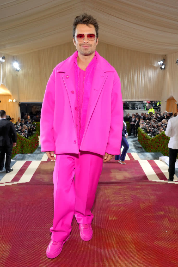 at the met gala in his suit