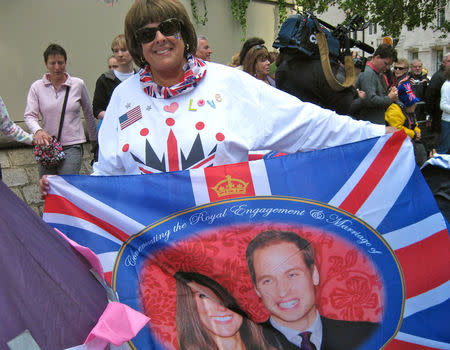 FILE PHOTO: Donna Werner waits outside Westminster Abbey for the wedding of Prince William and Kate Middleton in London, Britain April 28, 2011. Anita Atkinson/Handout via REUTERS