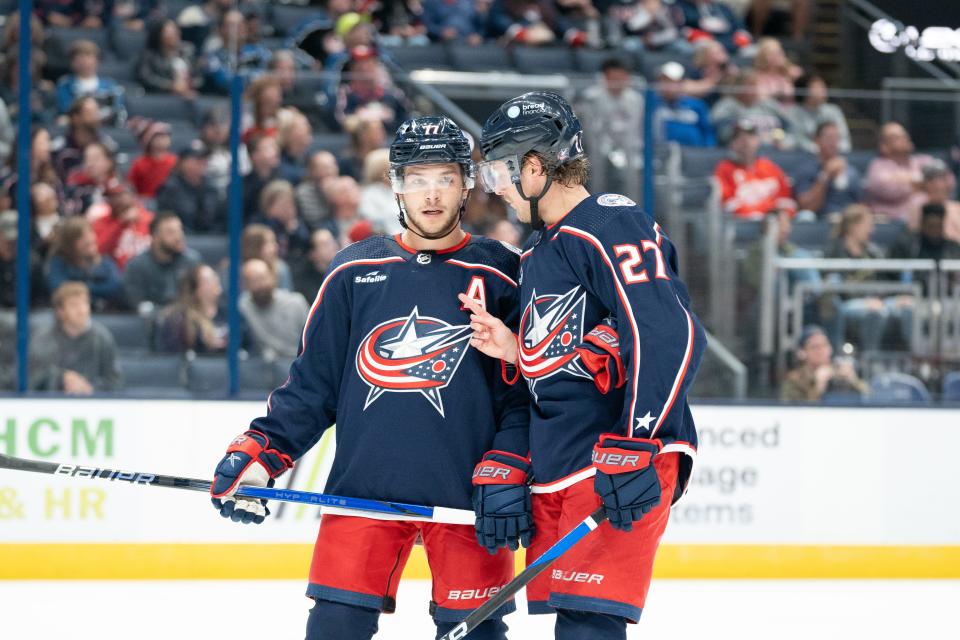 Oct. 5, 2023; Columbus, Ohio, United States;
Columbus Blue Jackets defenseman Adam Boqvist (27) talks to teammate Nick Blankenburg (77) before a face off during their game against the Washington Capitals on Thursday, Oct. 5, 2023 at Nationwide Arena.