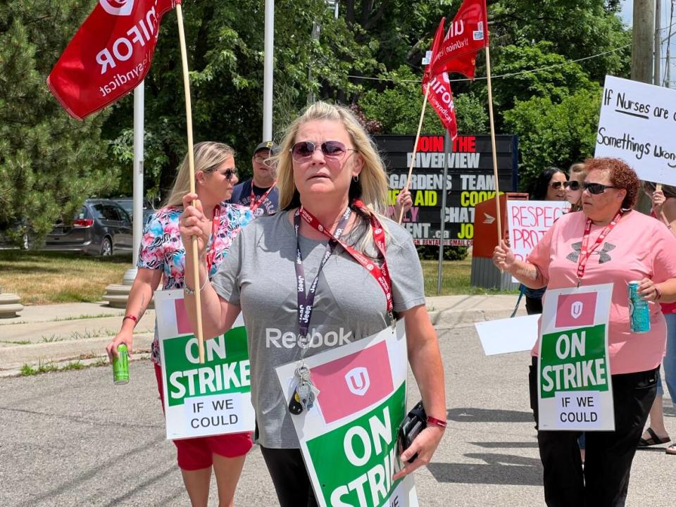 Staff, excluding nurses, at Riverview Gardens long-term care home in Chatham are protesting Thursday due to burn out and lack of vacation time. (Jacob Barker/CBC - image credit)