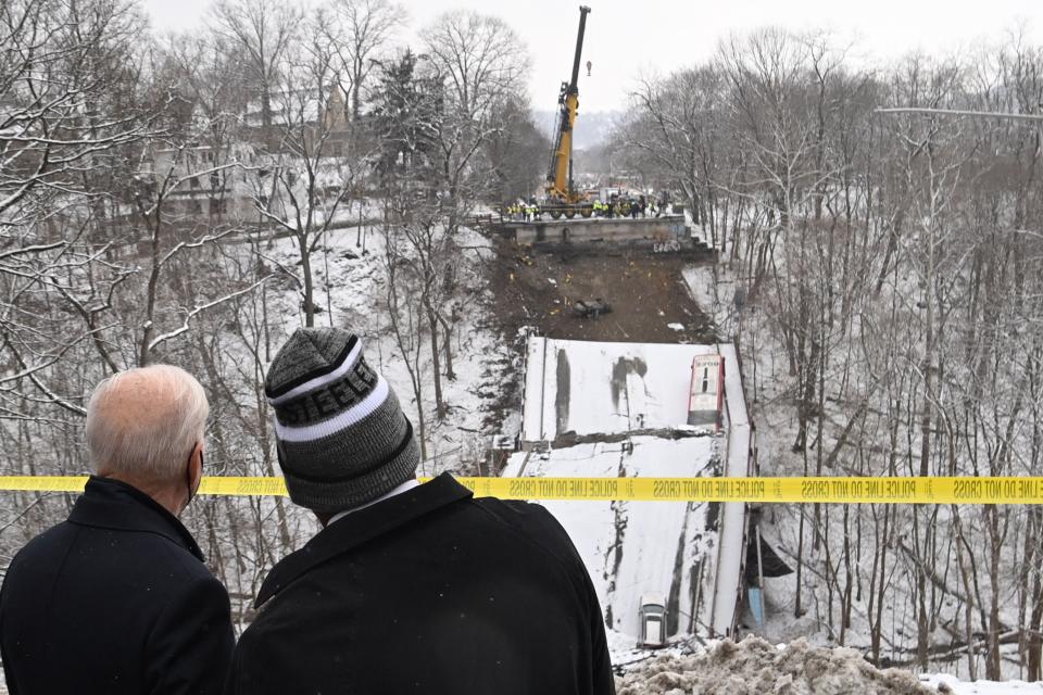 President Joe Biden and Pittsburgh Mayor Ed Gainey visit the scene of the Forbes Avenue Bridge collapse over Fern Hollow Creek in Frick Park in Pittsburgh in January.