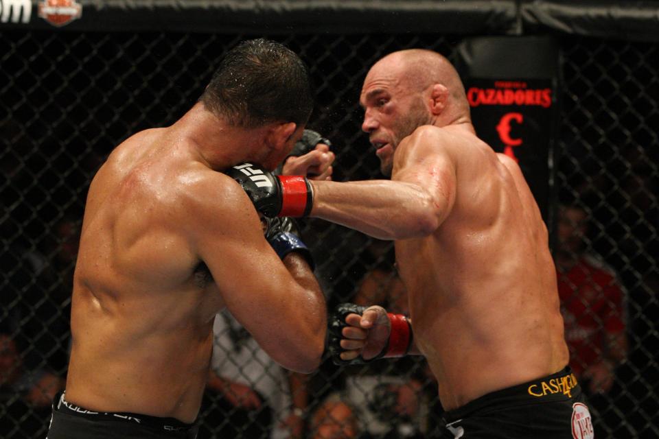 PORTLAND, OR - AUGUST 29:  Antonio Rodrigo "Minotauro" Nogueira (white shorts) def. Randy Couture (black shorts) - Unanimous Decisio at the Rose Garden on August 29, 2009 in Portland, Oregon.  (Photo by Josh Hedges/Zuffa LLC via Getty Images)