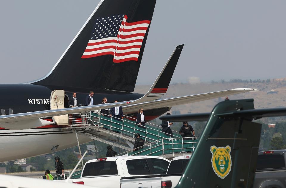 Members of former President Donald Trump's team disembark from his Boeing 757 after arriving at the Billings Logan International Airport in Billings, Mont., on Friday afternoon, Aug. 9, 2024, enroute to Bozeman (AP)