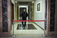 A Russian Federal Bailiffs Service officer guards a corridor leading to a courtroom inside the court in Yekaterinburg, Russia, Thursday, July 18, 2024, during a hearing of Wall Street Journal reporter Evan Gershkovich's suspected spying activities. (AP Photo/Dmitri Lovetsky)