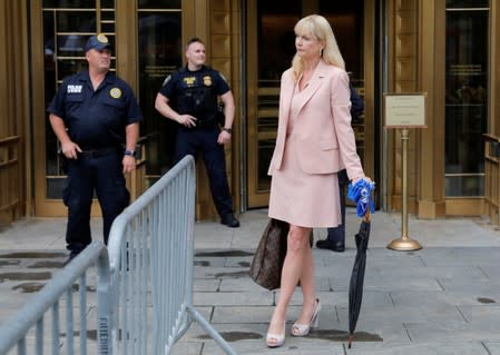 Lawyer Sigrid McCawley leaves the Southern District of New York federal courthouse after bail hearing in Jeffrey Epstein's sex trafficking case in New York City