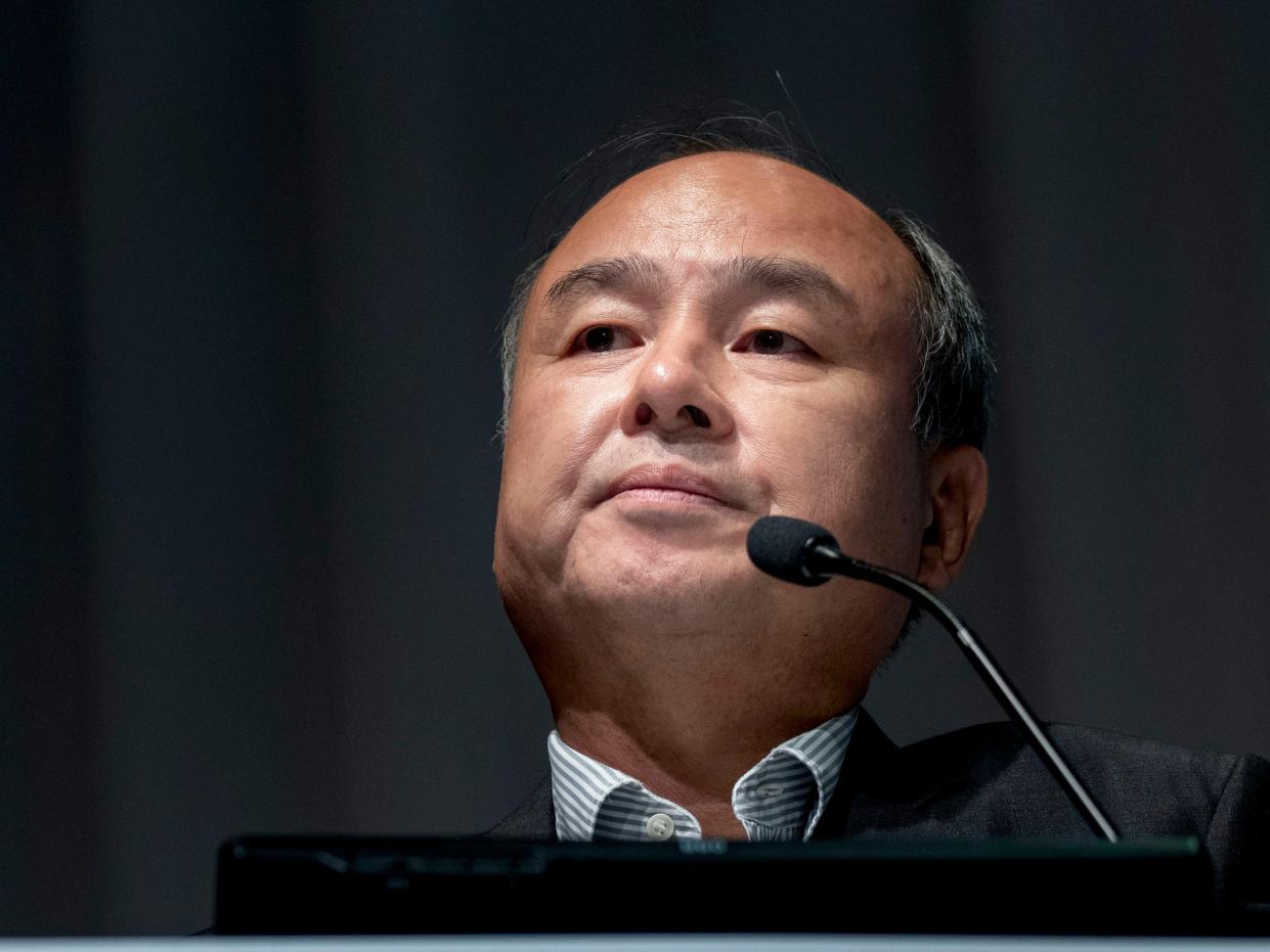 Masayoshi Son, chairman and chief executive officer of SoftBank Group Corp., reacts during a news conference in Tokyo, Japan, on Wednesday, Aug. 7, 2019.