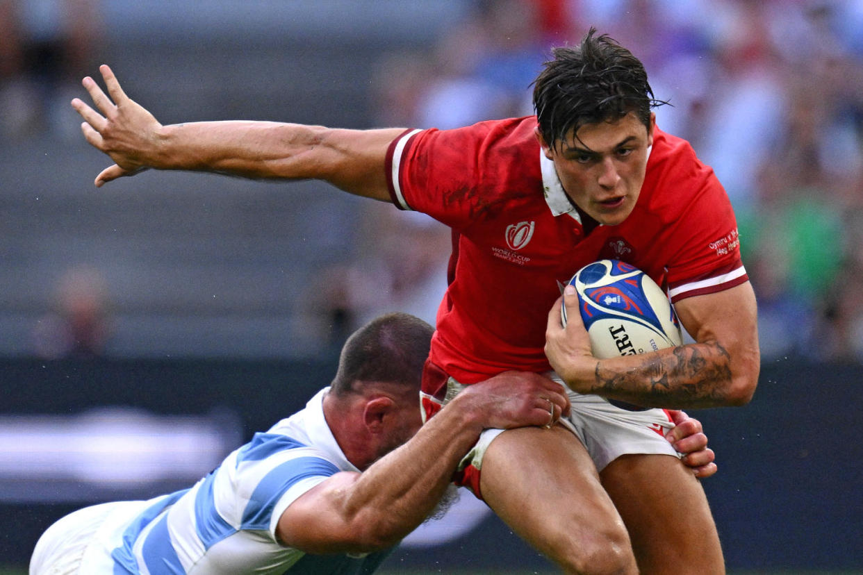 Wales' wing Louis Rees-Zammit is tackled by Argentina's flanker Marcos Kremer during the France 2023 Rugby World Cup quarter-final in Marseille, France, on Oct. 14, 2023. (Christophe Simon / AFP - Getty Images file)