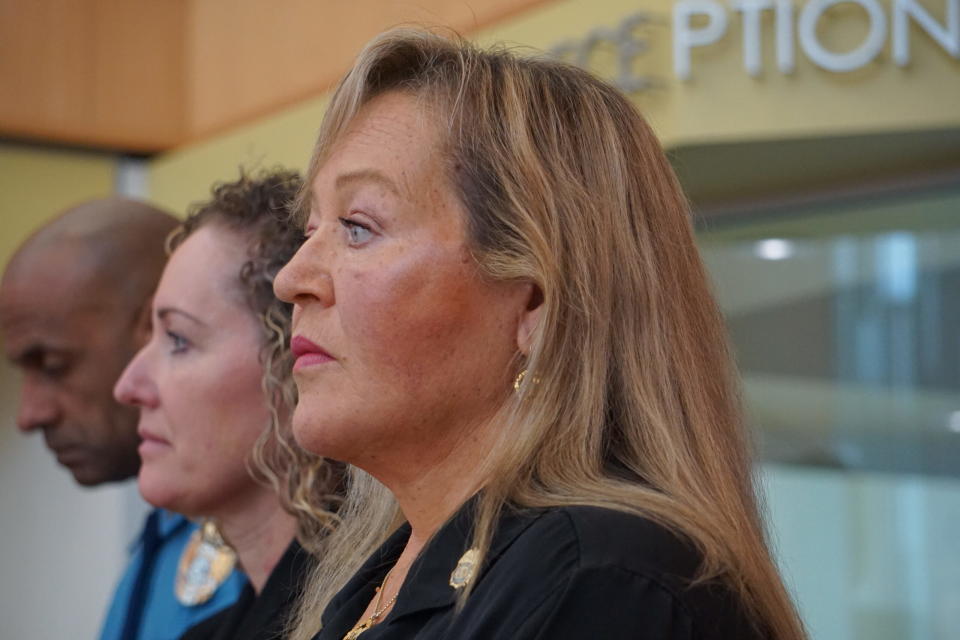 Sandy Snodgrass, who lost her 22-year-old son Bruce to a fentanyl overdose in 2021, listens on May 6, 2024, to Karen Malcolm-Smith speak about the loss of her son in 2017. Snodgrass and Malcolm-Smith were speakers at a news conference on fentanyl education. (Photo by Yereth Rosen/Alaska Beacon)