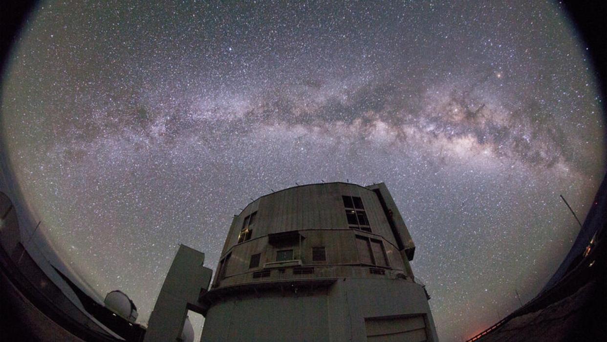  A photo of the Subaru Telescope against the night sky with the Milky Way clearly visible. 