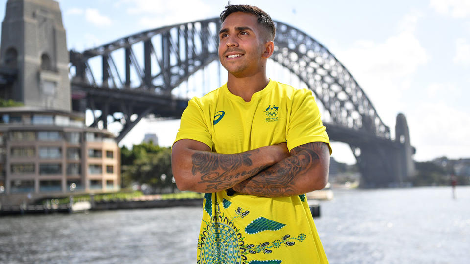 Aussie Olympian Maurice Longbottom wears an Olympic Rugby shirt with an Aboriginal design.