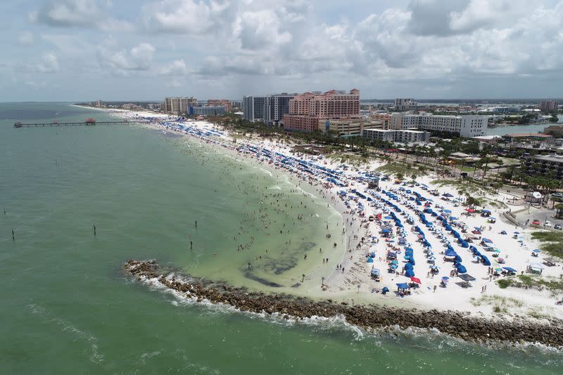 Sun seekers gather at Clearwater Beach on Independence Day