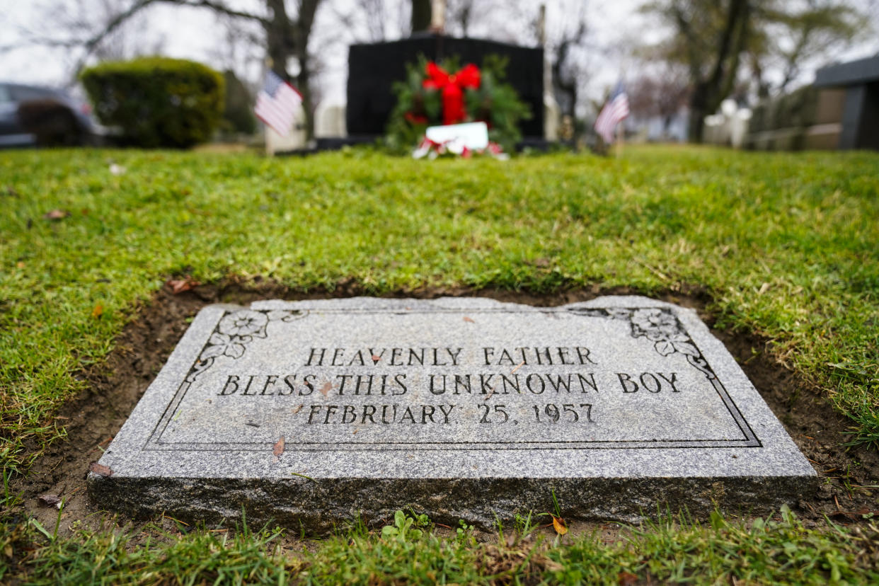 The gravesite of a small boy whose battered body body was found abandoned in a cardboard box decades ago is seen in Philadelphia, Wednesday, Dec. 7, 2022. Nearly 66 years after the boy was found, Philadelphia police are set to reveal the identity of the victim in the city's most notorious cold case. Police say detective work and DNA analysis helped them learn the name of a youngster who'd been known to generations of Philadelphians as the "Boy in the Box." Authorities are set to publicly release the victim's name on Thursday. (AP Photo/Matt Rourke)