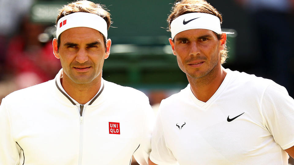 Roger Federer and Rafael Nadal, pictured here at Wimbledon in 2019.