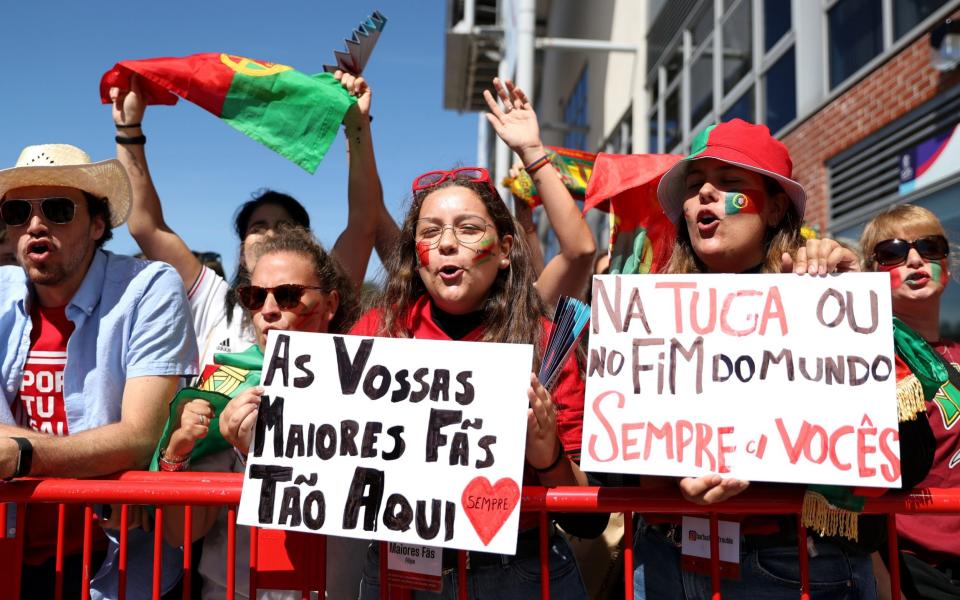 LEIGH, ENGLAND - JULY 09: Fans of Portugal show their support outside the stadium prior to the UEFA Women's Euro 2022 group C match between Portugal and Switzerland at Leigh Sports Village on July 09, 2022 in Leigh, England - Charlotte Tattersall/UEFA