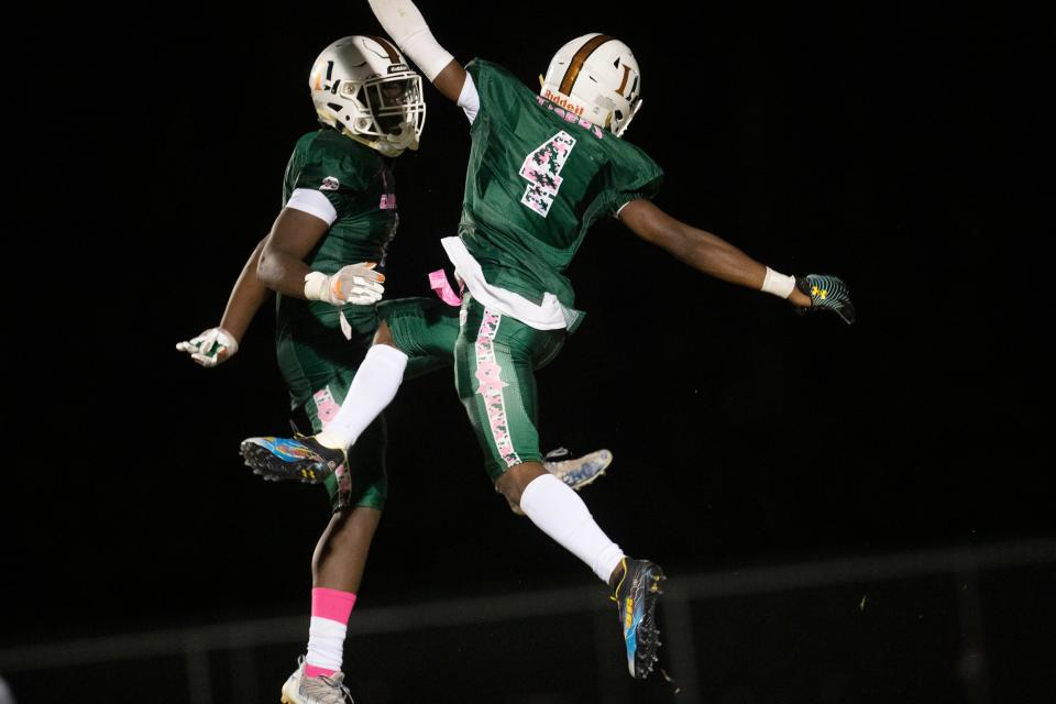 DunbarÕs TJ Abrams #4 celebrates a touchdown against Fort Myers High School on Thursday, September 30, 2021.  