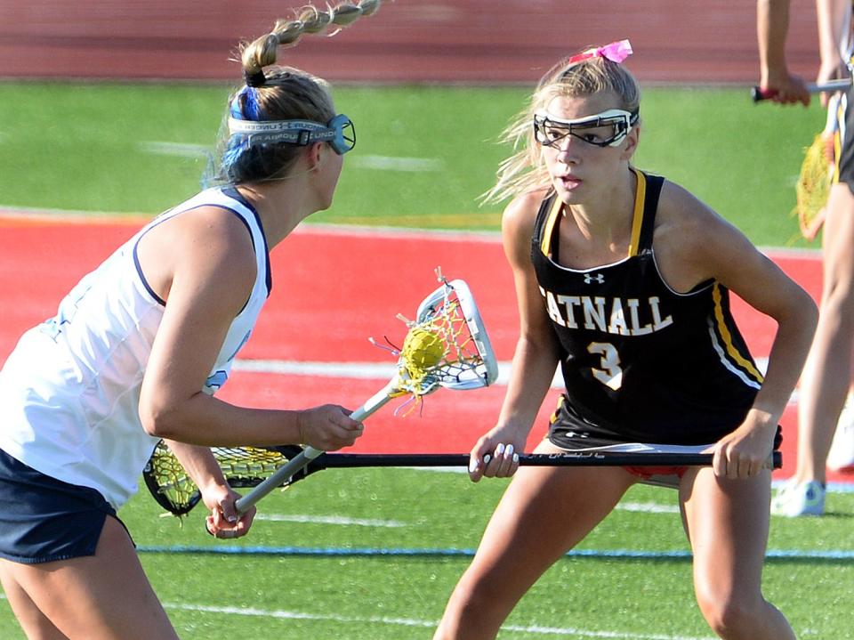 Kali Clayton of Tatnall (3) locks in defensively against Cape Henlopen's Alexi Nowakowski during the DIAA Girls Lacrosse championship game on May 25 at Alumni Stadium. Both players are ranked highly among our final Top 45 in Delaware high school girls lacrosse.