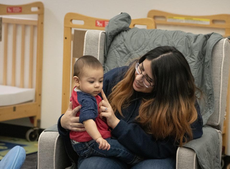 Valerie Lara, 18, plays with her 6 moth old son, Isaac, at Marcos de Niza High SchoolÕs daycare. Marcos de Niza High School offers Teenage Pregnancy Program (TAPP) to help pregnant and parenting teens finish high school.