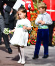 <p>Prince George and Princess Charlotte took on the roles of page boy and bridesmaid once again for Princess Eugenie and Jack Brooksbank’s wedding on October 12. They both wore outfits designed by Amaia Arrieta of Amaia Kids with sashes to reflect the artwork of Mark Bradford. <em>[Photo: Getty]</em> </p>