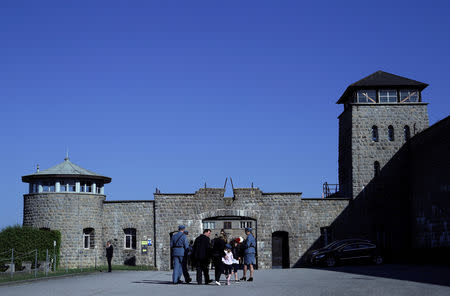 FILE PHOTO: People arrive at the memorial site of the former Mauthausen concentration camp ahead of commemoration ceremonies, Mauthausen, Austria, May 06, 2018. REUTERS/Lisi Niesner/File Photo