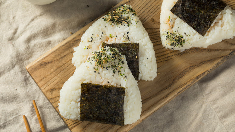 Homemade onigiri on a board