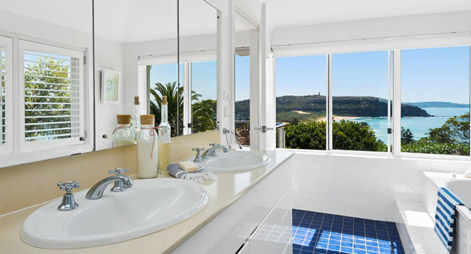 Even the bathrooms boast stunning views of Palm Beach Source: Domain