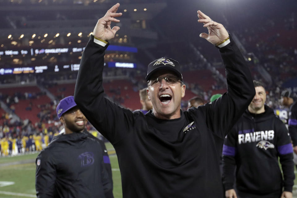 FILE - In this Nov. 25, 2019, file photo, Baltimore Ravens head coach John Harbaugh celebrates after their win against the Los Angeles Rams during an NFL football game in Los Angeles. After a loss to the Cleveland Browns earlier this season, Harbaugh gathered the players in the locker room to provide his candid take on the state of an underachieving squad that looked nothing like a Super Bowl contender. Flash forward to last Sunday, when the Ravens completed the regular season with a 14-2 record by beating the Pittsburgh Steelers 28-10 despite resting seven starters because they had already clinched the top seed in the AFC for the first time in franchise history. Comeback complete. (AP Photo/Marcio Jose Sanchez, File)